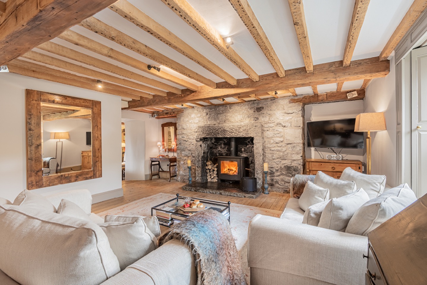 Farmhouse lounge with wood burner and exposed beams