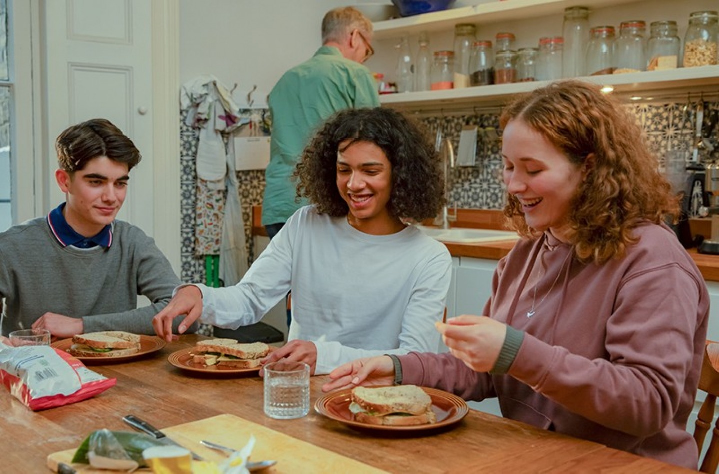 Foster family sitting around the breakfast table