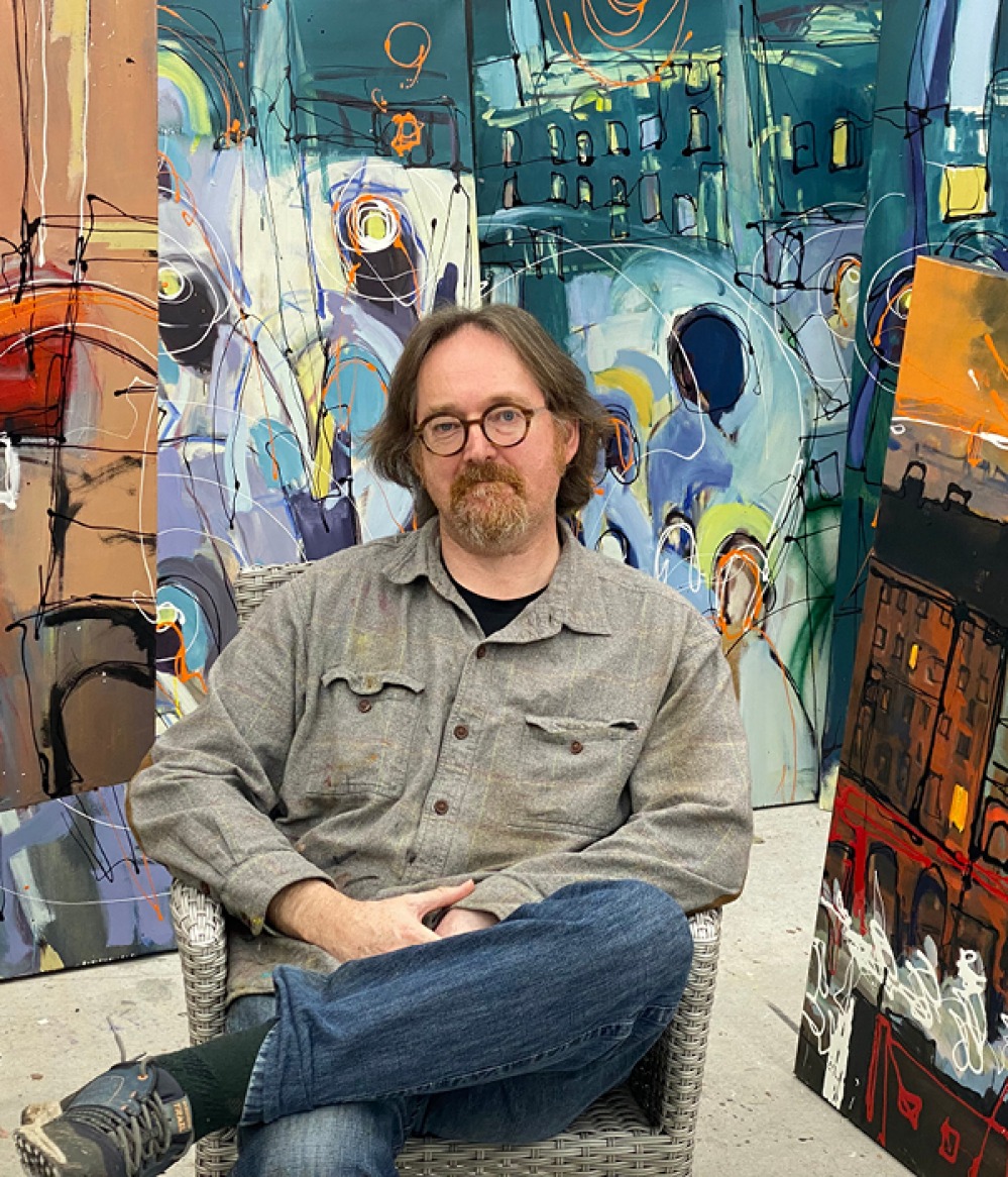 Martin sitting in his studio